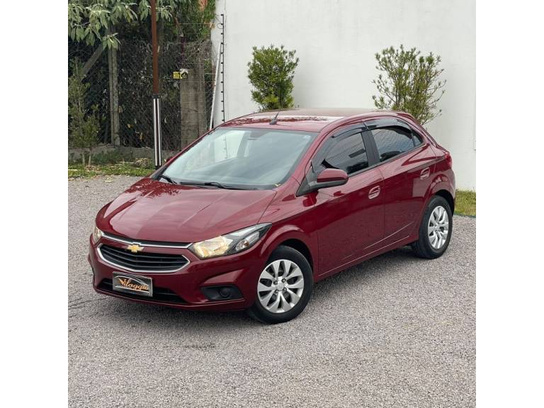 CHEVROLET - ONIX - 2017/2018 - Vinho - R$ 58.900,00