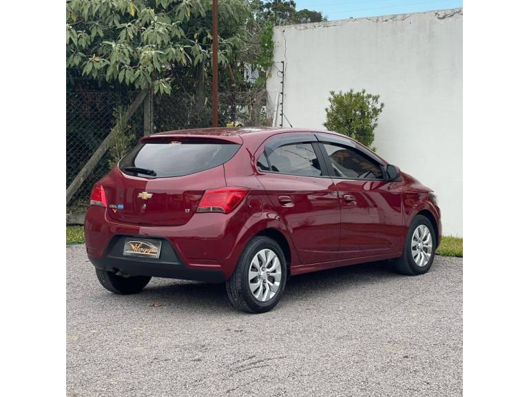 CHEVROLET - ONIX - 2017/2018 - Vinho - R$ 58.900,00