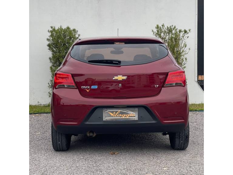 CHEVROLET - ONIX - 2017/2018 - Vinho - R$ 58.900,00